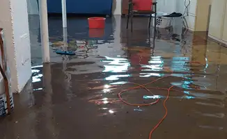 Basement with boiler, cabinets and washing machine completely flooded in Wichita, KS
